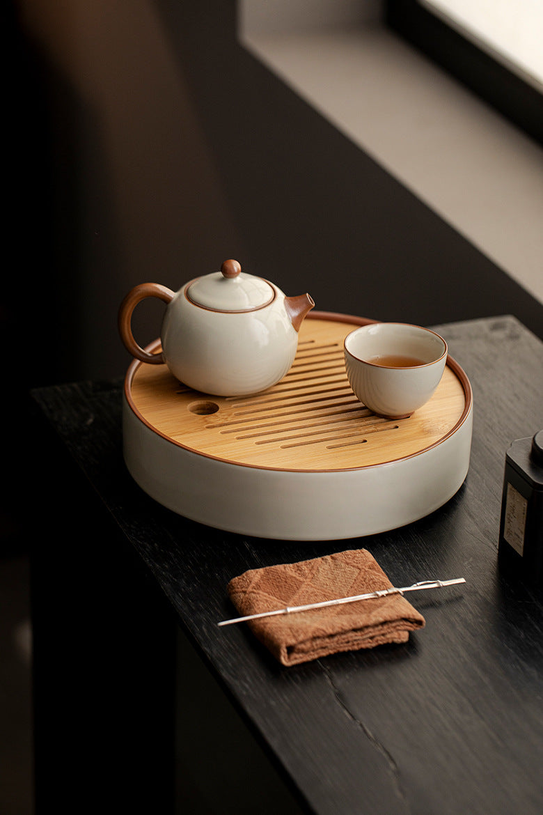 Ru kiln beige household ceramic tea tray, Kung Fu tea set, round bamboo tray, water storage dry tea tray